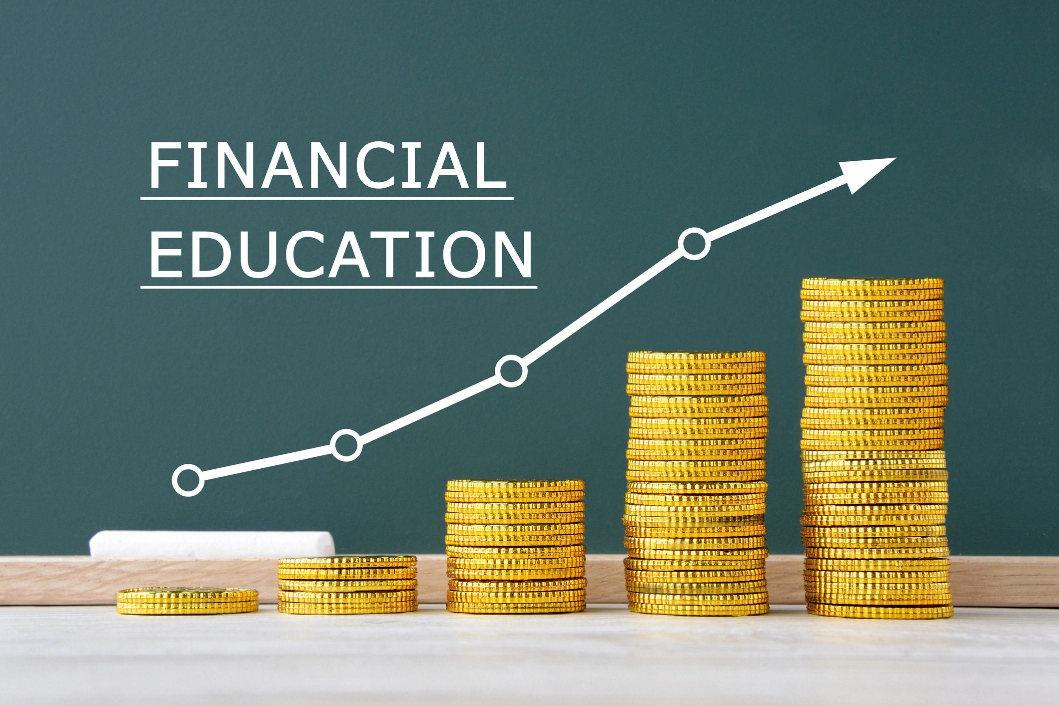 Financial literacy education with coins and learning materials